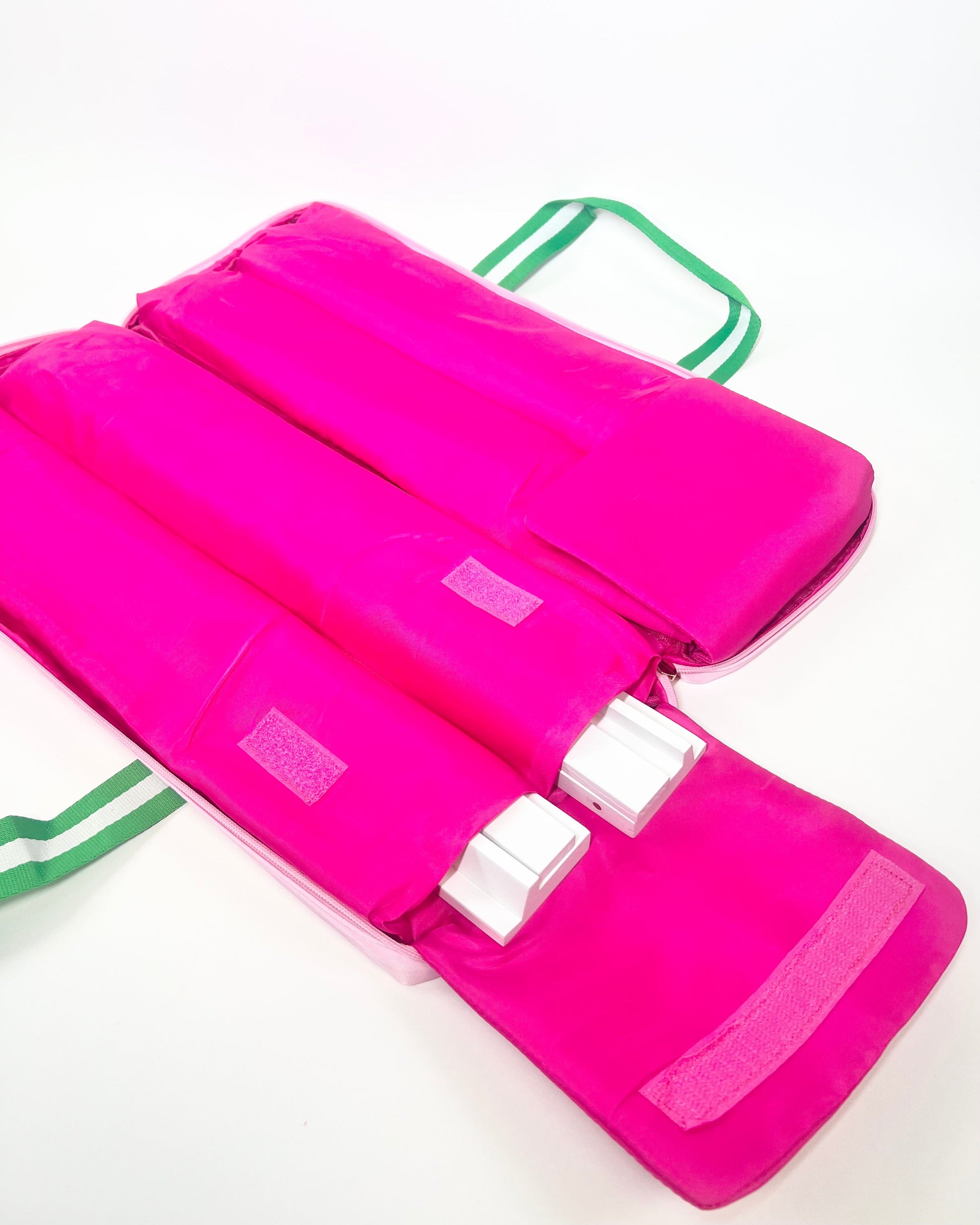 Hot Pink interior of rack bag with pockets for racks on a white background