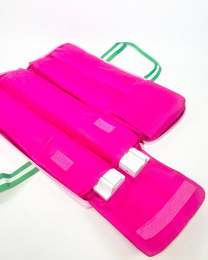 Hot Pink interior of rack bag with pockets for racks on a white background