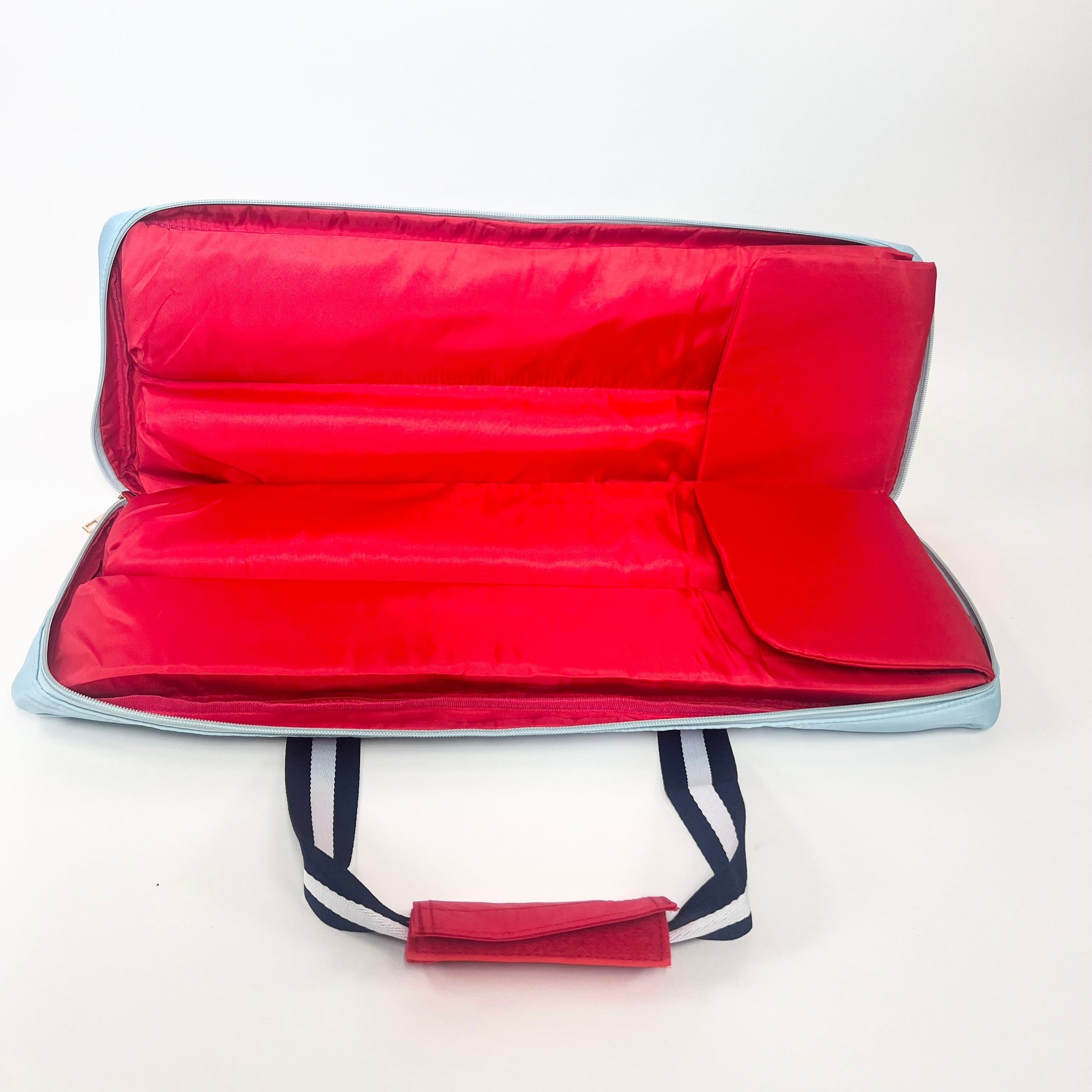 Red Interior of light blue rack bag on white background